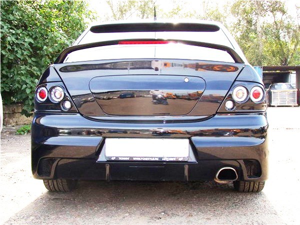 Бампер задний в стиле "EVO" для Mitsubishi Lancer IX (2003-2009) купить недорого с доставкой в Балашиха